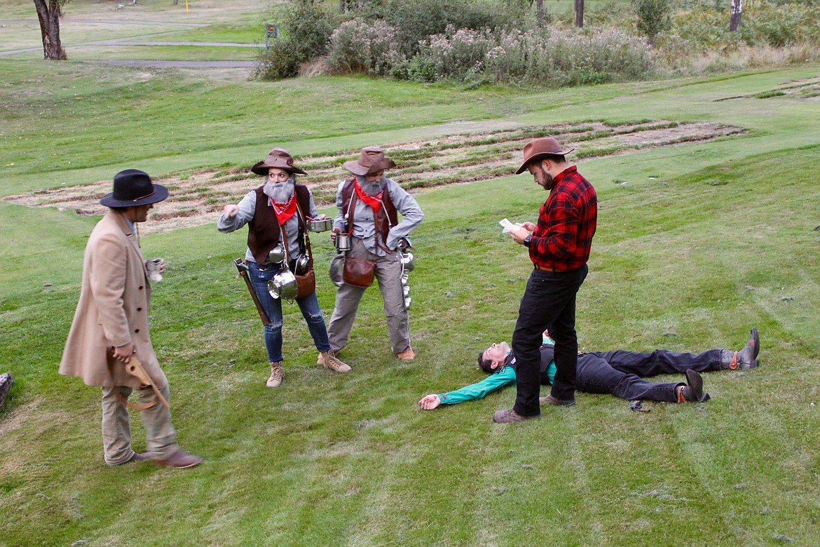 From left: Wingerson, Bre Orr, Monica Miller and Josh Van inspect the &#147;body&#148; of Paul Robert just after he was &#147;shot.&#148; That ol&#146; Wavy Will Bronchus rolled quite a ways after taking a bullet to the chest.