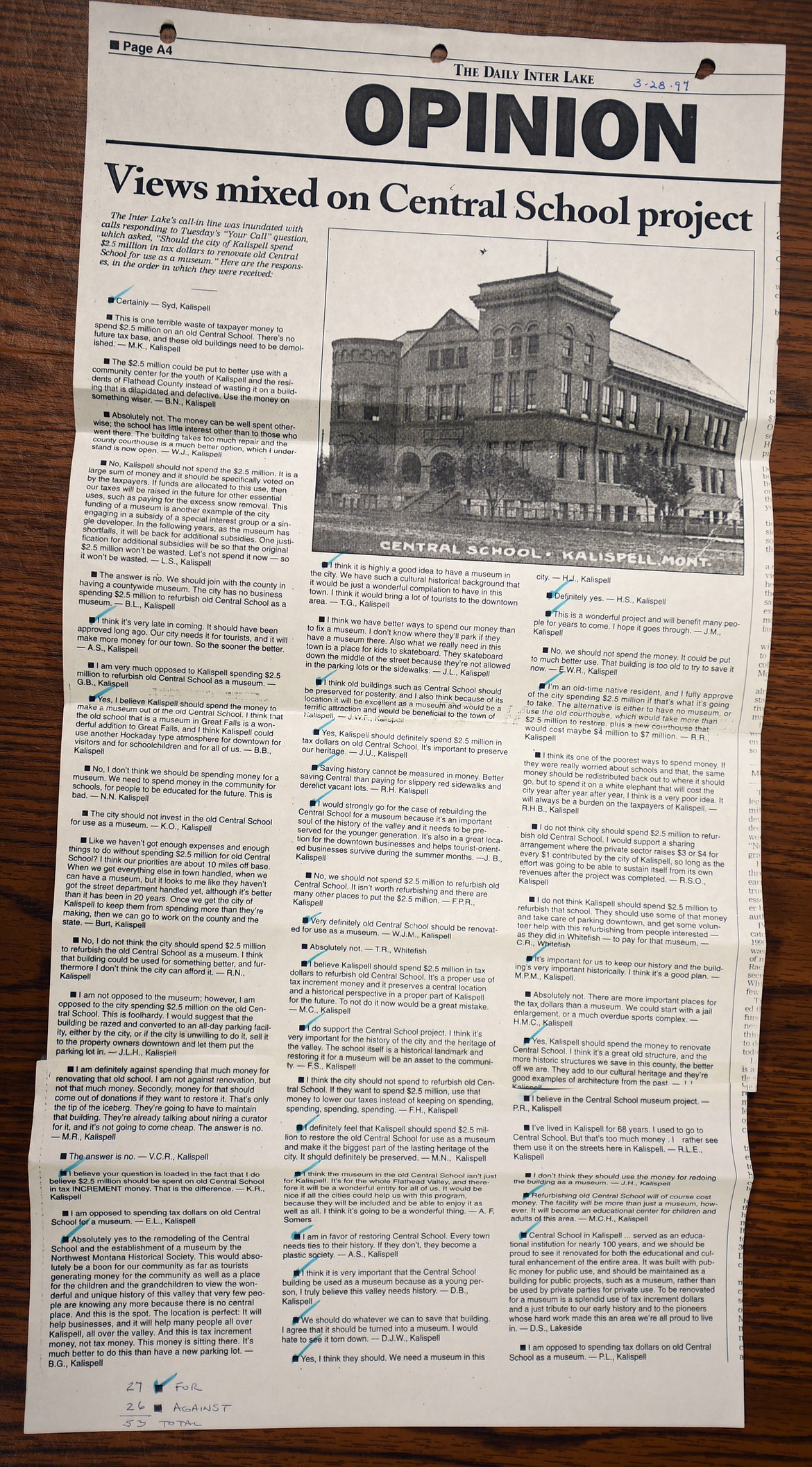 A three-ring binder contains all of the articles and opinions that were stirred up in March of 1997 as Kalispell debated the decision to save the historic Central School or not. In that binder is this copy of an opinion page from the Daily Inter Lake that ran on March 28, 1997. The museum staff counted the opinions for and against and came out to 27 for (marked with a blue check) and 26 against, showing how evenly divided the residents were on this issue.(Brenda Ahearn/Daily Inter Lake)