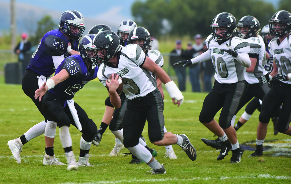 THE CHARLO Vikings defenses swarms to a Flint Creek ball carrier during the Charlo-Flint Creek game Friday night at Charlo High School. The Vikings, and the St. Ignatius Bulldogs will take on each other in a critical conference showdown Friday night at Mission High School.  (Jason Blasco/Lake County Leader)