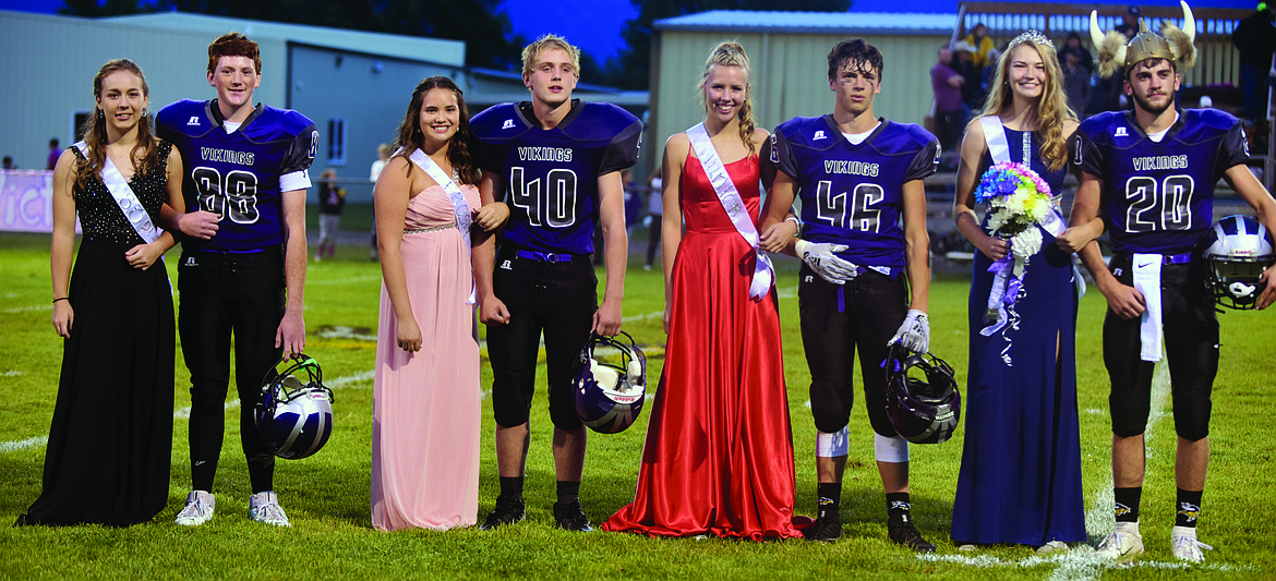 THE CHARLO High School homecoming royalty pose during the halftime festivities in the Charlo-Flint Creek game Friday night at Charlo High School. (From left): Kayla Tomlin and Anthony Castro (Sophomores), Mila Hawk and Stephen Loli (Freshmen), Carlee Fryberger and Nathan Clark (juniors), and Kira McPhail and Bridger Foust King and queen (seniors), all pose for the camera during the halftime showcase. (Photo by Jason Blasco/Lake County Leader)