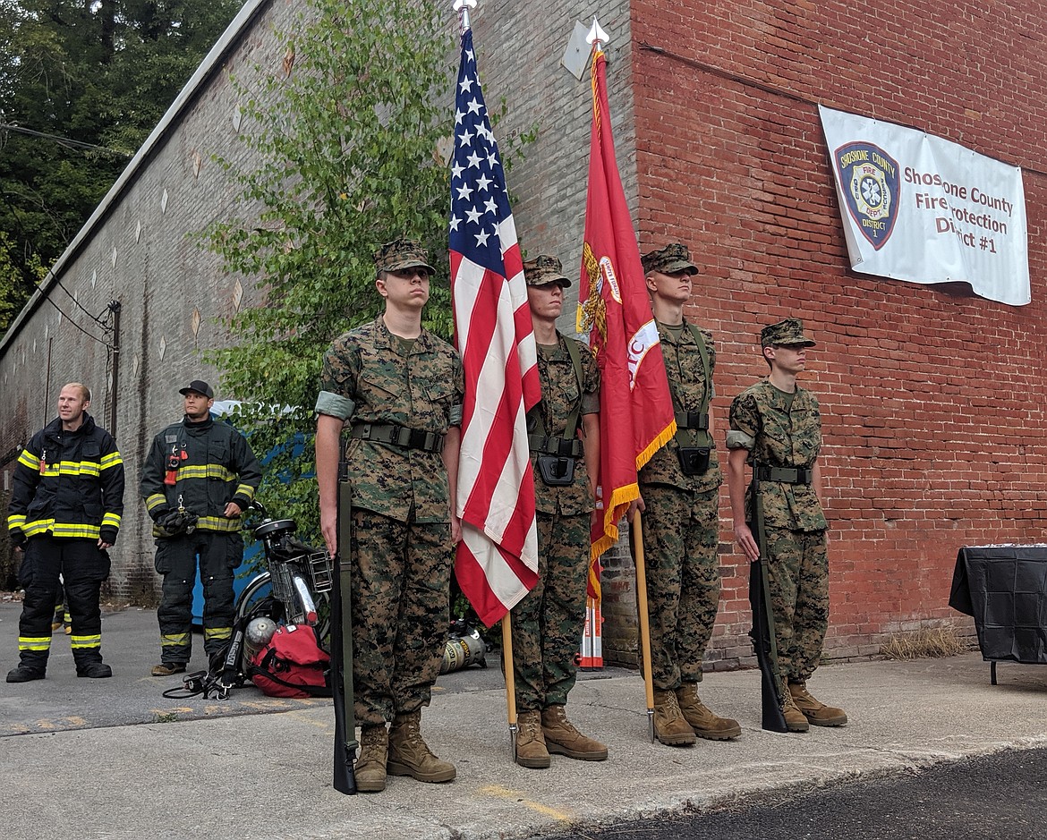 Members of the Kellogg High School Marine Corp. JROTC present the colors before the climb begins.