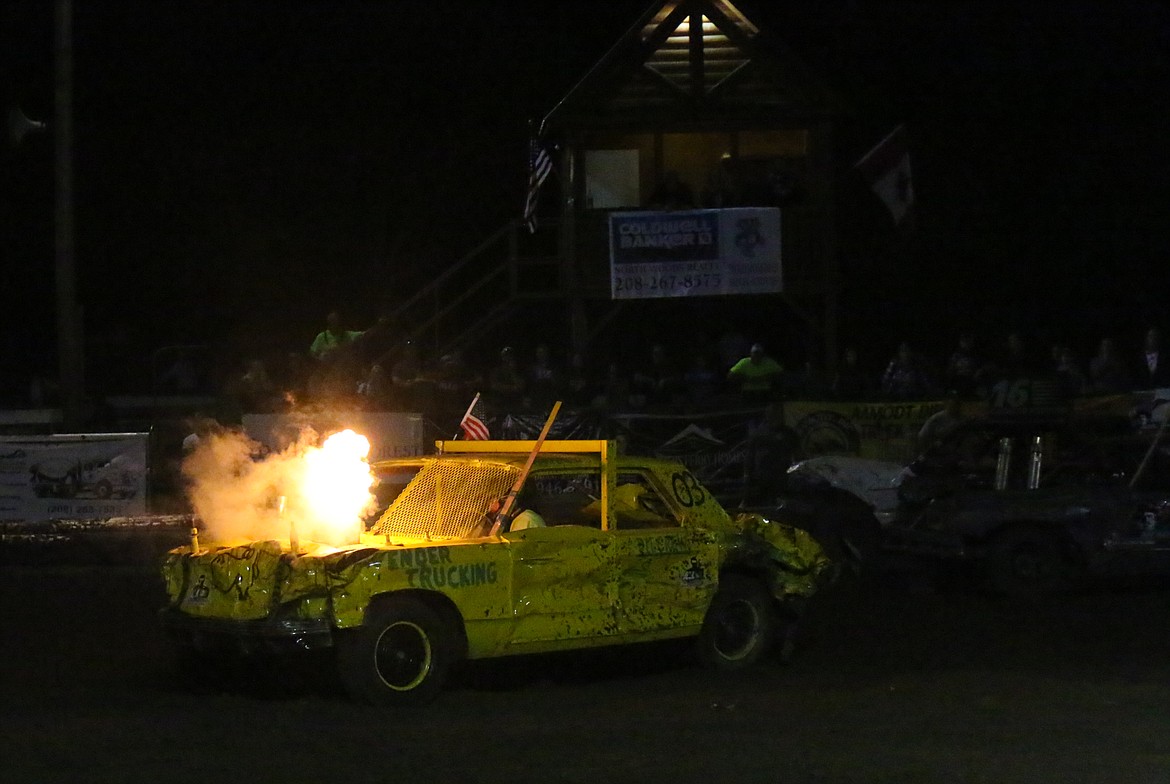 Photo by MANDI BATEMAN
Casey Cavender&#146;s car belching flames.