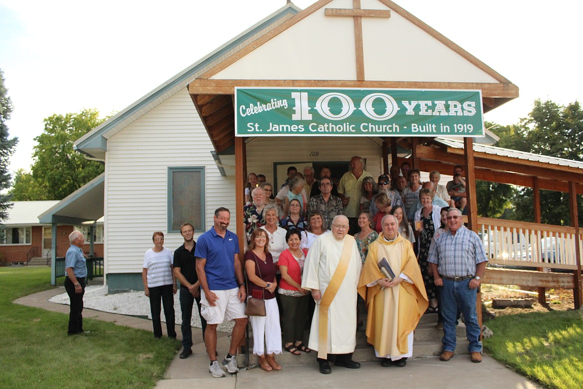 THE ST. JAMES Catholic Church Congregation in front of the 100 year-old building. (John Dowd/Clark Fork Valley Press)