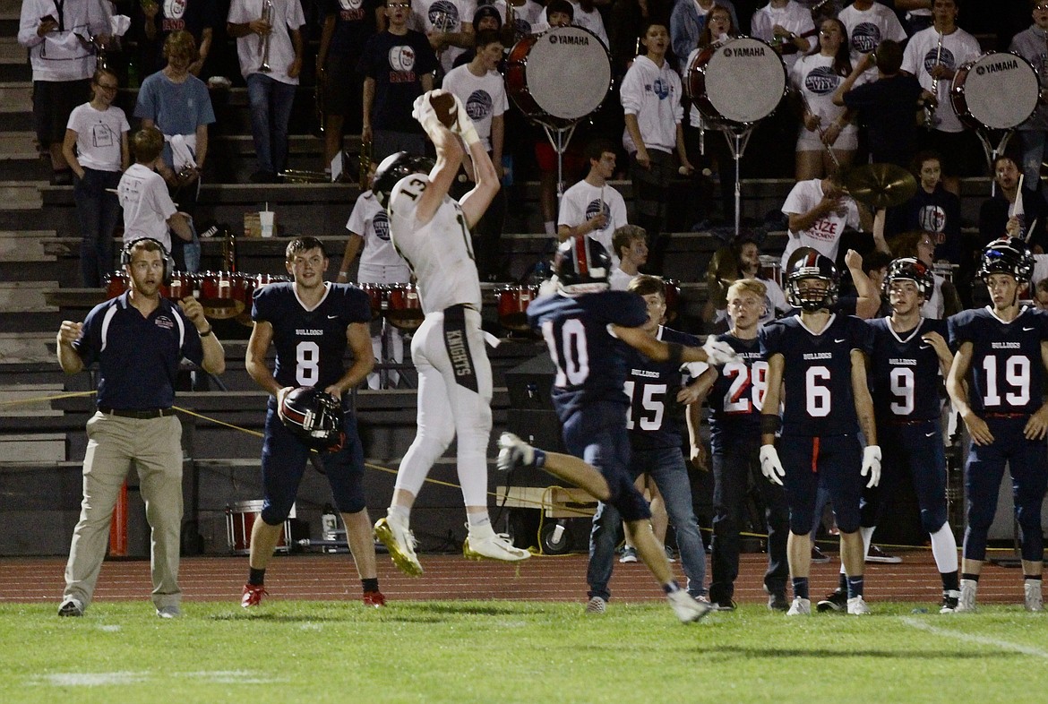 Casey McCarthy/ Columbia Basin Herald Cooper Christensen goes up to make the grab in the second half against Ellensburg on Friday night.