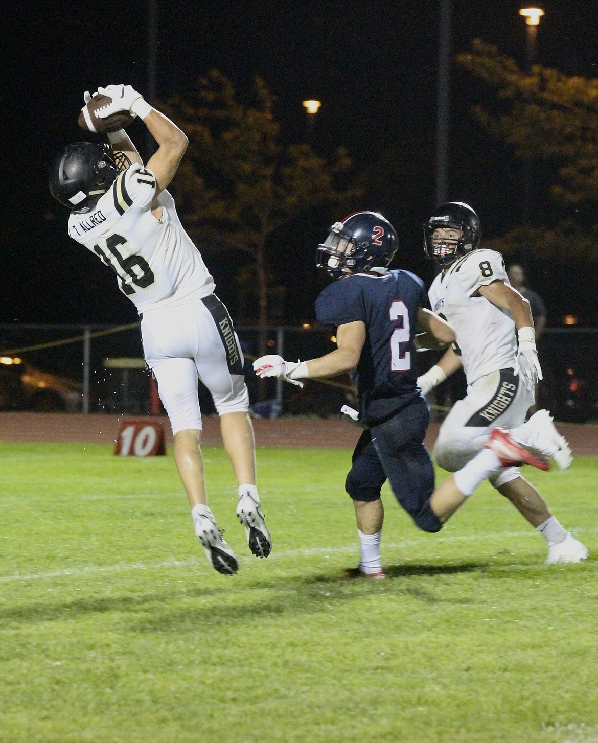 Casey McCarthy/Sun Tribune
Royal&#146;s Tyler Allred pulls down the interception in the second half as the Knights went on to win 21-16.