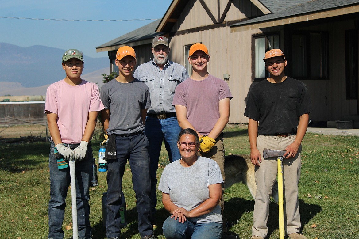 SOME OF the boys from Wood Creek Academy and Ruth Bartholomew, along with Sean Thorne. (John Dowd/Clark Fork Valley Press)