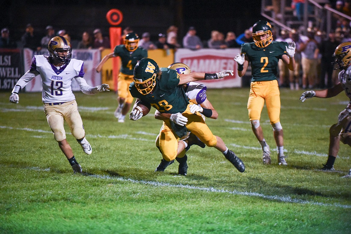 Zach Veneman breaks the plane for a touchdown during Whitefish's 28-15 home win over Polson on Friday. (Daniel McKay/Whitefish Pilot)