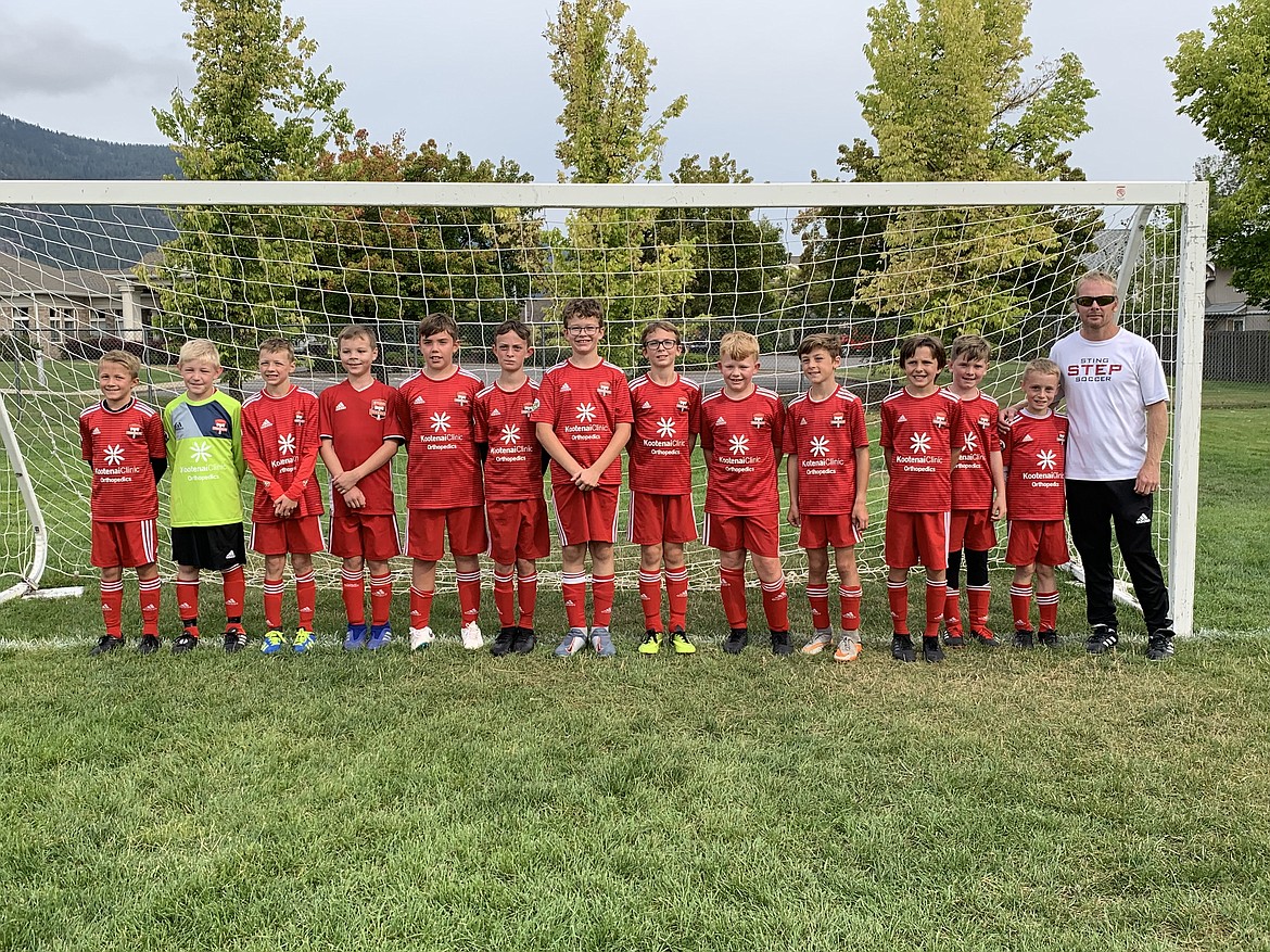 Courtesy photo
The Timbers FC North 09&#146; Yellow boys soccer team played two PSPL COPA league games over the weekend. On Saturday the Timbers beat the IEYSA Cascade 09&#146; at home, at Hayden Meadows 6-0. Cooper Hermes and Luke Fritts each had 1 goal and 1 assist, Taylor Smith, Ryan Miller, Payson Shaw, and Wyatt Hartzell had 1 goal each, and Creighton Lehosit had 1 assist.  Finneas Case, Taylor Smith, Ryan Miller, and Stefan Pawlik teamed for the shutout in goal. For their second game on Sunday the Timbers traveled to Moscow and won 8-0 against the EW 09&#146; Surf SC Palouse.  Stefan Pawlik lead the team with 3 goals, Blake Wise has 2 goals, Luke Fritts had 1 goal and 2 assists, Taylor Smith had 2 assists, Creighton Lehosit had 1 goal and 1 assist, Payson Shaw and Cooper Hermes had 1 goal each, and Luc Buckland had 1 assist. The goalkeepers were Ryan Miller, Taylor Smith, Stefan Pawlik and Luc Buckland with the shutout. From left are Blake Wise, Ryan Miller, Cooper Hermes, Stefan Pawlik, Taylor Smith, Finneas Case, Creighton Lehosit, Sam Mandel, Luc Buckland, Payson Shaw, Wyatt Hartzell, Cale Hanners, Luke Fritts and coach Matt Fritts.