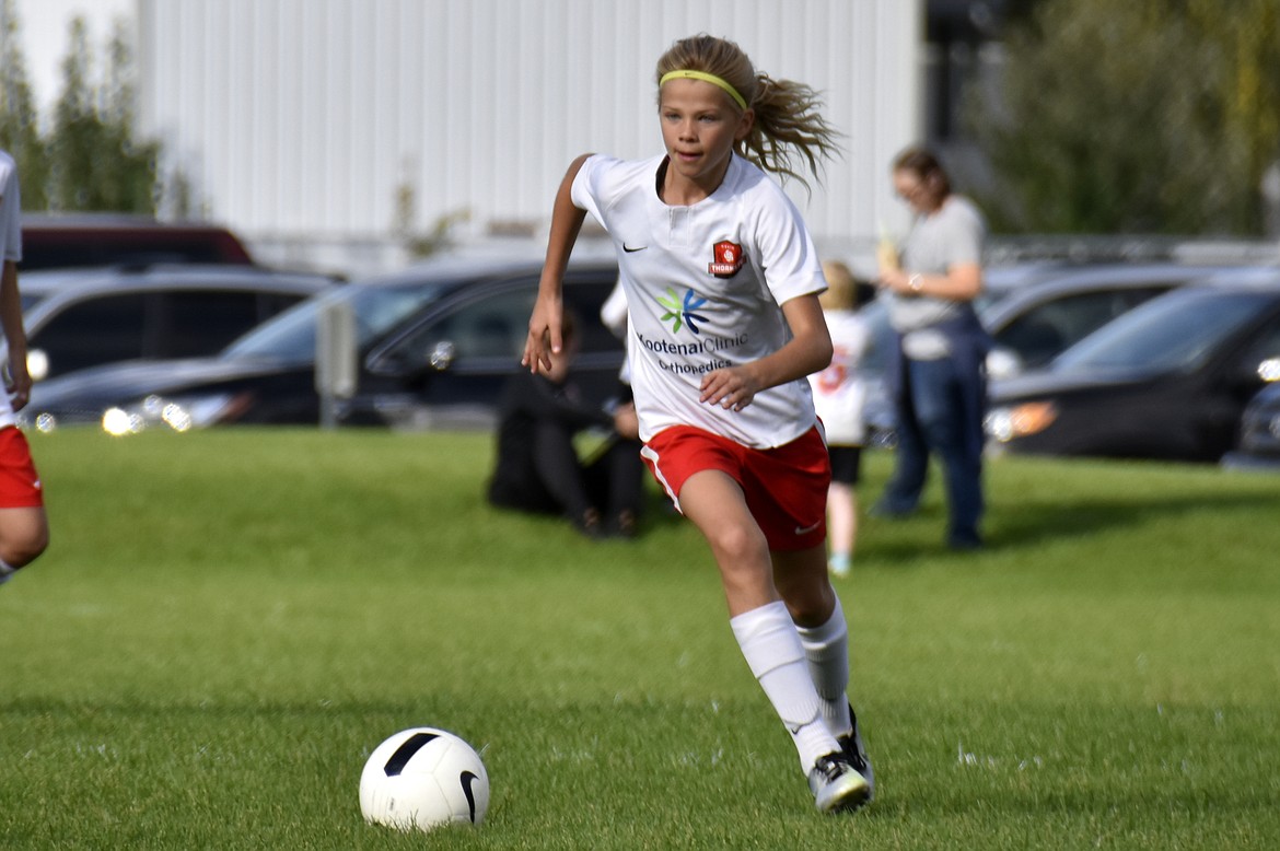 Photo by SUZI ENTZI
The Thorns North FC 08 Girls Red soccer team beat Reign Academy 08G on Saturday 2-1. Isabella Grimmett and Allison Carrico each had one goal, Kamryn Kirk and Sloan Waddell each had one assist, and Adysen Robinson was in goal for the Thorns. Pictured is Ella Pearson of the Thorns.