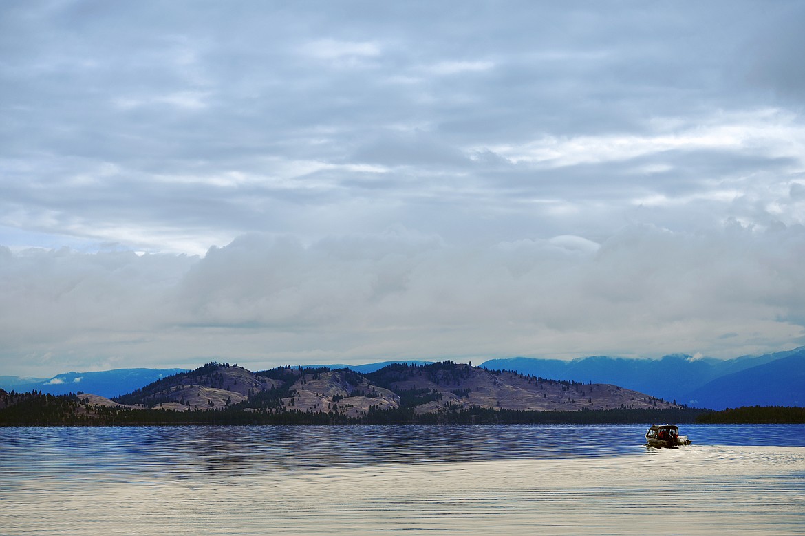 Amy Grout, park management specialist with Montana Fish, Wildlife and Parks, pilots a boat across Flathead Lake to Wild Horse Island State Park on Thursday, Sept. 19. (Casey Kreider/Daily Inter Lake)