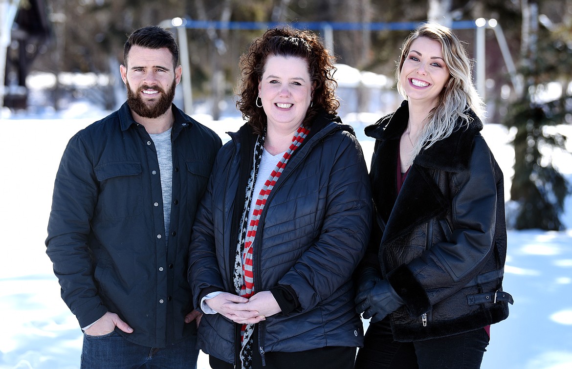 From left, Luke Heffernan, owner of Prime Enterprises Construction Services; Tonya Horn, a social worker; and Ashley Steyh are pictured at Woodland Park in February. The group is planning to open a warming center to meet the local need for a low-barrier shelter. (Brenda Ahearn/Daily Inter Lake file)