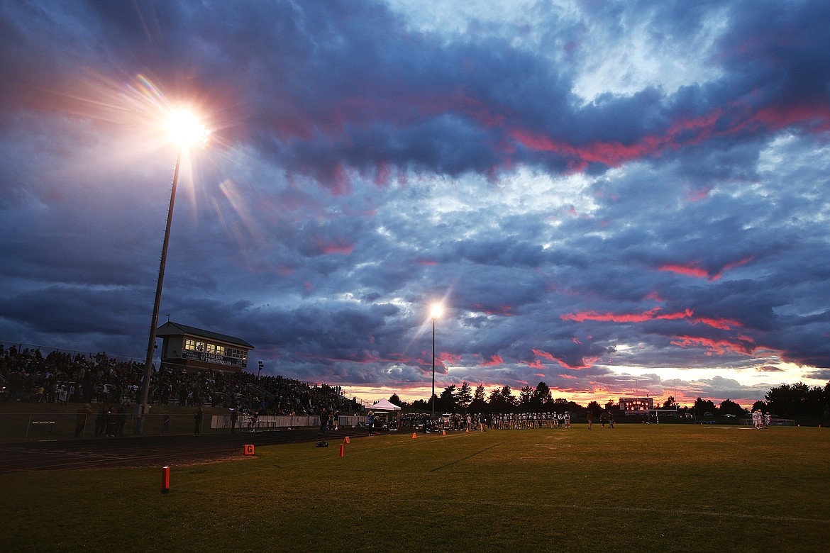 The sun sets in the distance during Friday night&#146;s football game between Lake City and Lakeland at Lake City High.