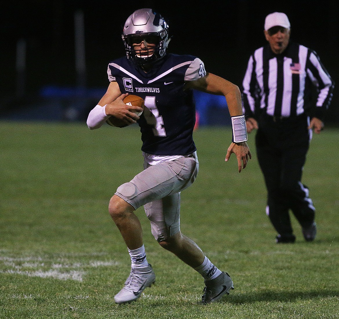 Lake City High quarterback Chris Irvin rushes the ball upfield during Friday&#146;s game against Lakeland.