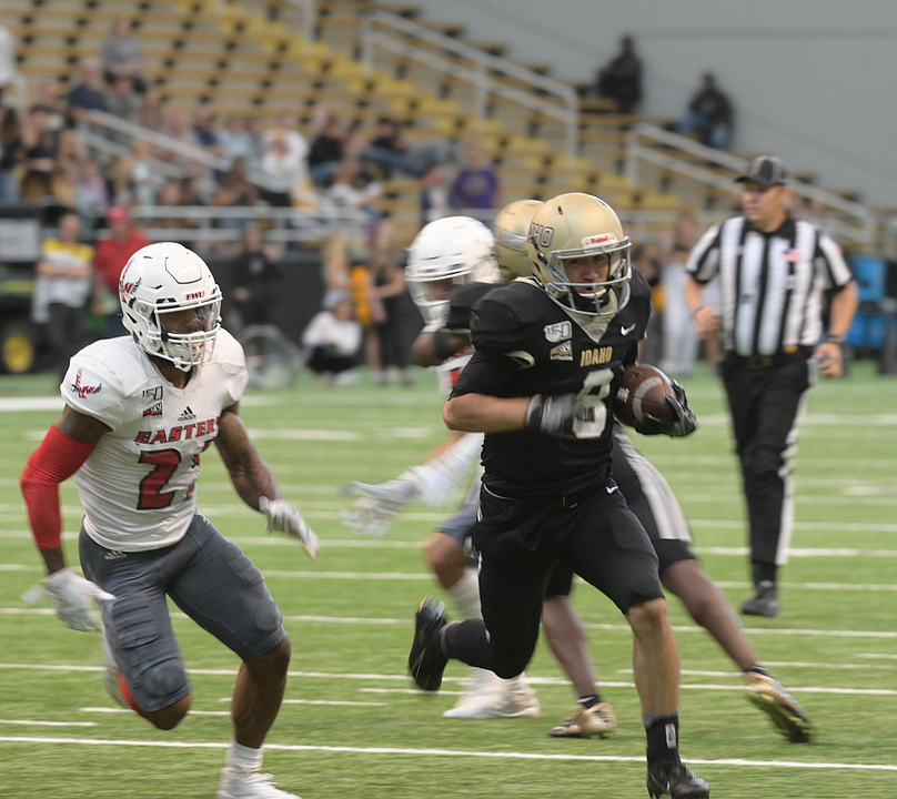 MELISSA HARTLEY/University of Idaho athletics
Idaho quarterback Mason Petrino scores on a 20-yard run in the second quarter against Eastern Washington on Saturday at the Kibbie Dome in Moscow.