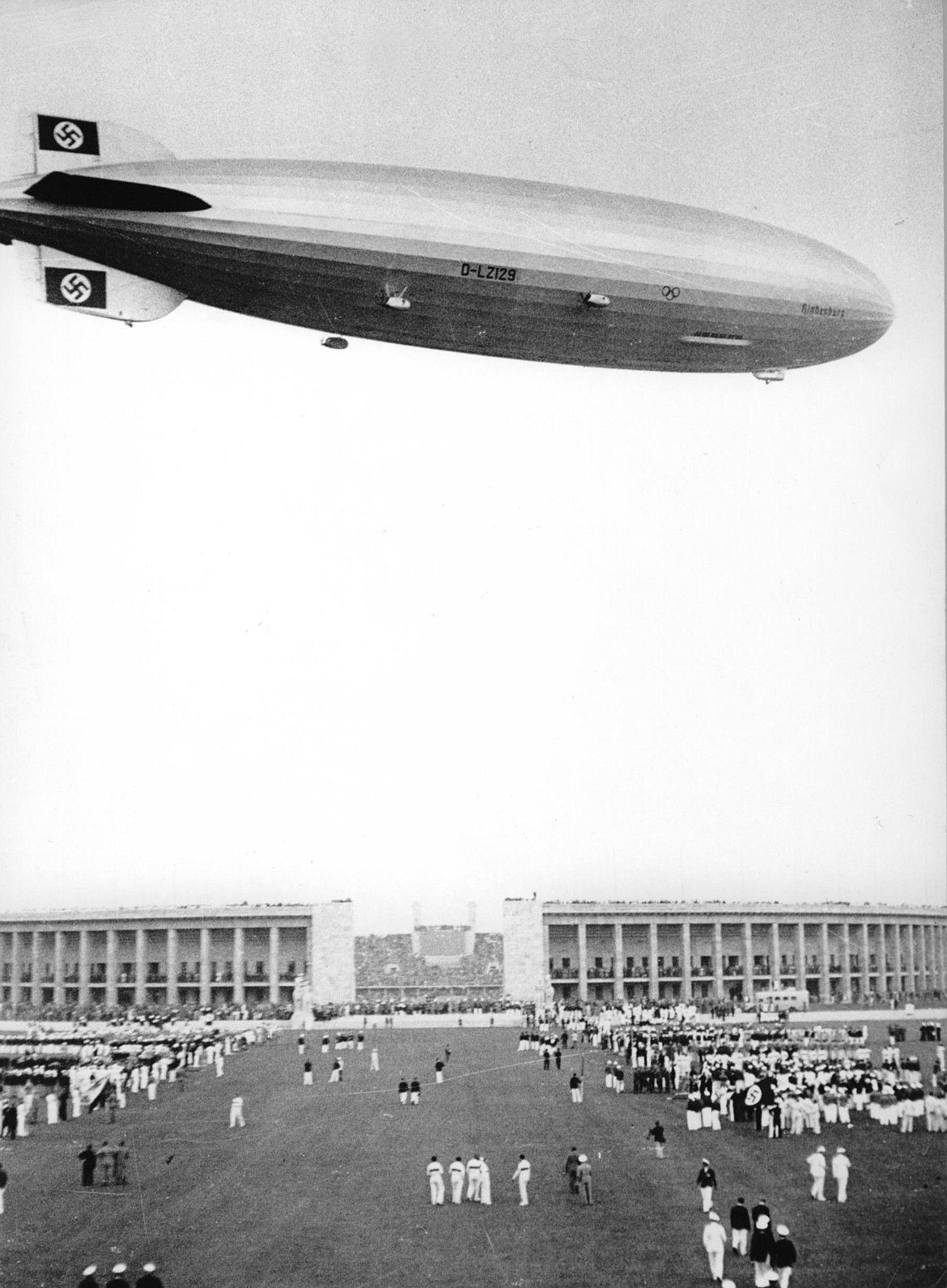 WIKIMEDIA COMMONS
Hindenburg flying over stadium at 1936 Olympic Games in Berlin, where African-American Jesse Owens won four Gold Medals, infuriating Hitler.