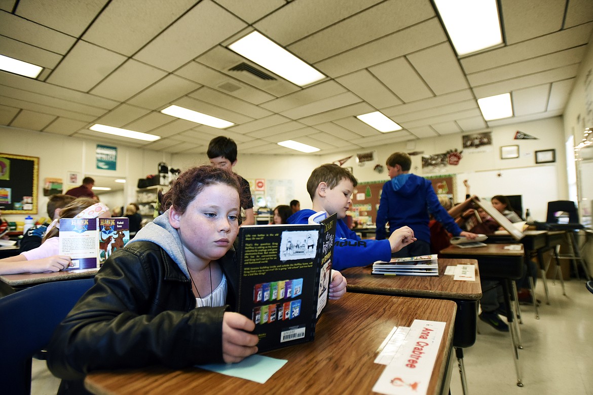 Fourth-grader Anna Crabtree reads at Ruder Elementary School in Josh Preiss&#146; class in Columbia Falls on Sept. 11. (Casey Kreider/Daily Inter Lake)