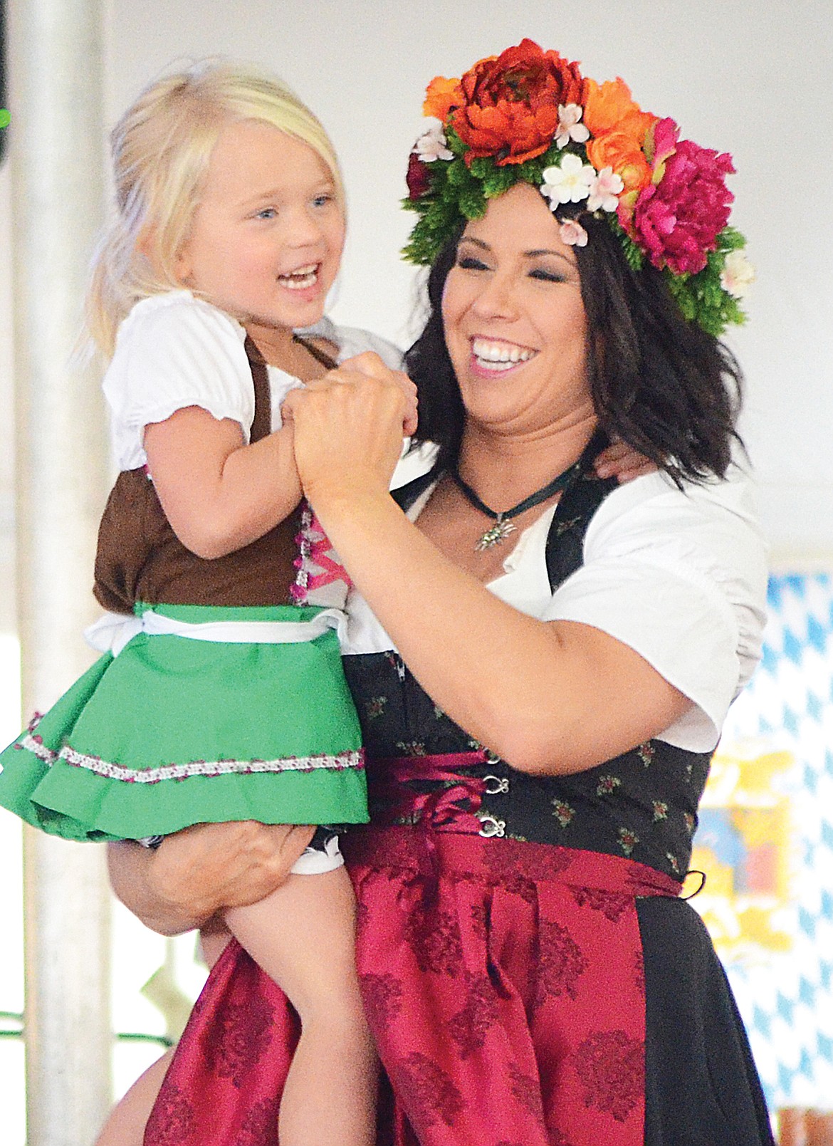 Shauna Dunn dances with Grace Dunn at the Great Northwest Oktoberfest celebration on Saturday in Whitefish.