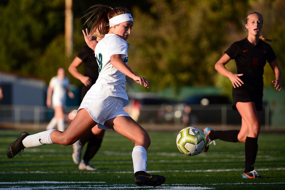 Glacier's Madison Becker (18) looks to shoot against Flathead during crosstown soccer at Legends Stadium on Tuesday. (Casey Kreider/Daily Inter Lake)