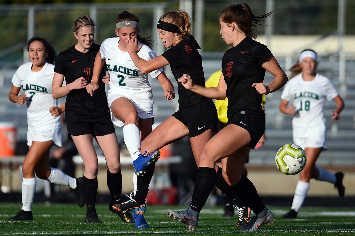 Glacier's Emily Cleveland (2) scores a goal in the first half against Flathead during crosstown soccer at Legends Stadium on Tuesday. (Casey Kreider/Daily Inter Lake)