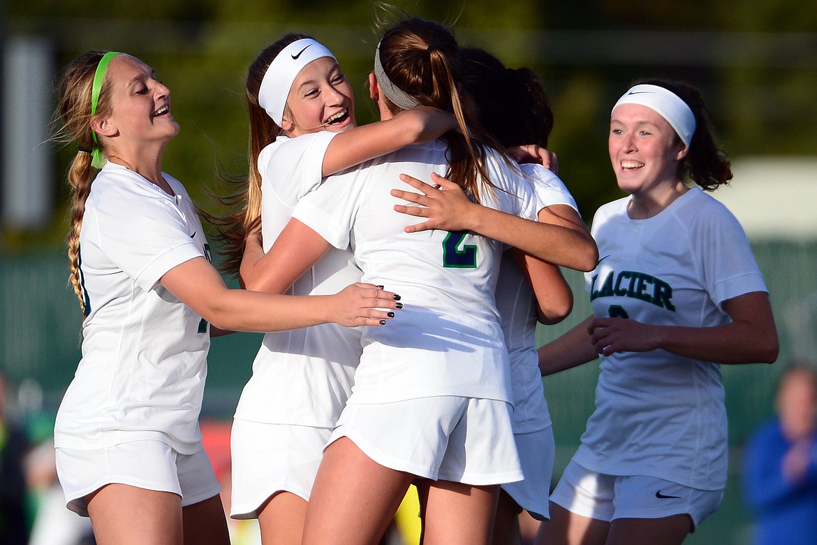 Glacier celebrates after Emily Cleveland's (2) first half goal against Flathead during crosstown soccer at Legends Stadium on Tuesday. (Casey Kreider/Daily Inter Lake)