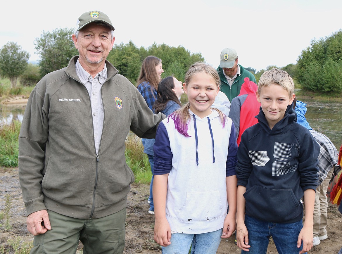 (Photo by MARY MALONE)
In the third year of wetland exploration and education for Southside students, Miles Benker with Idaho Fish and Game poses with two of the fifth graders who attended the first event as third graders, Aspen Ames, center and Aiden Evans, right.