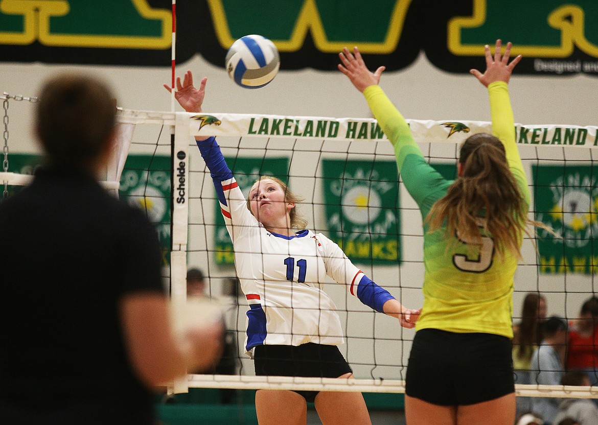 Coeur d&#146;Alene High&#146;s Madi Symons spikes the ball in Thursday&#146;s match at Lakeland High. (LOREN BENOIT/Press)