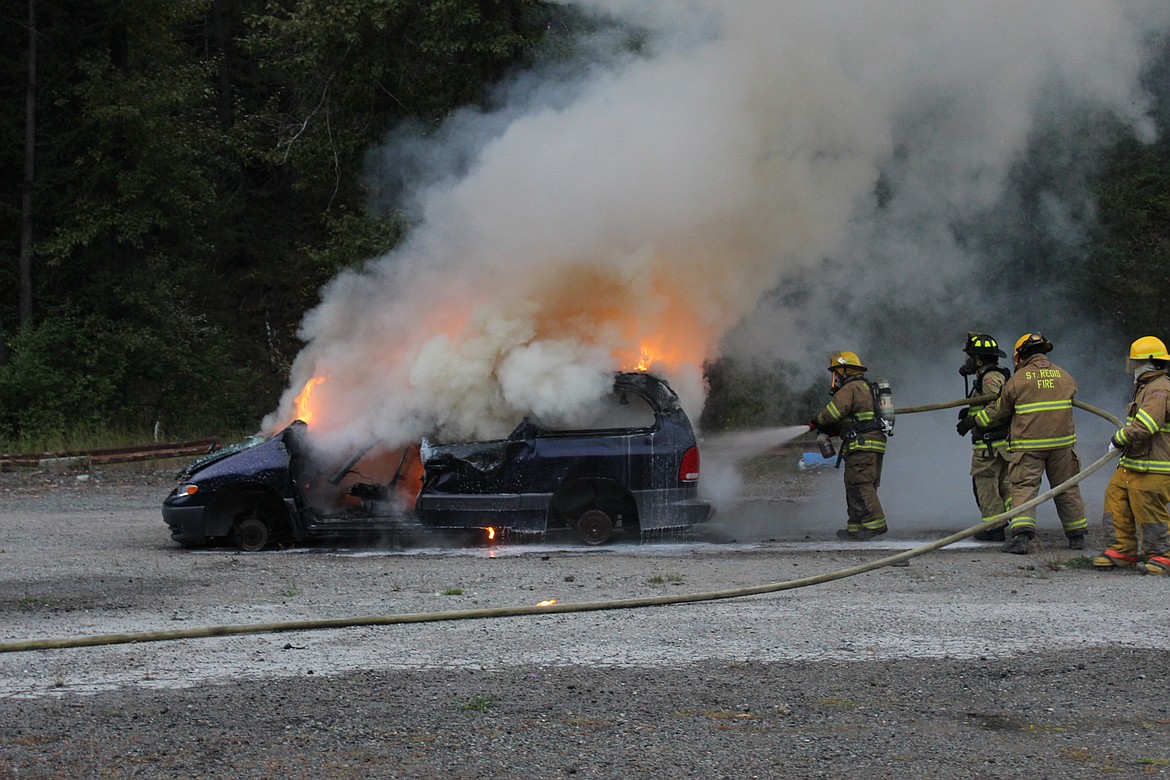 FIREFIGHTERS FROM the St. Regis, Superior and West End volunteer departments worked at the West End&#146;s Saltese fire station recently to practice with a new type of fire fighting agent. (Photo courtesy West End Volunteer Fire Department)