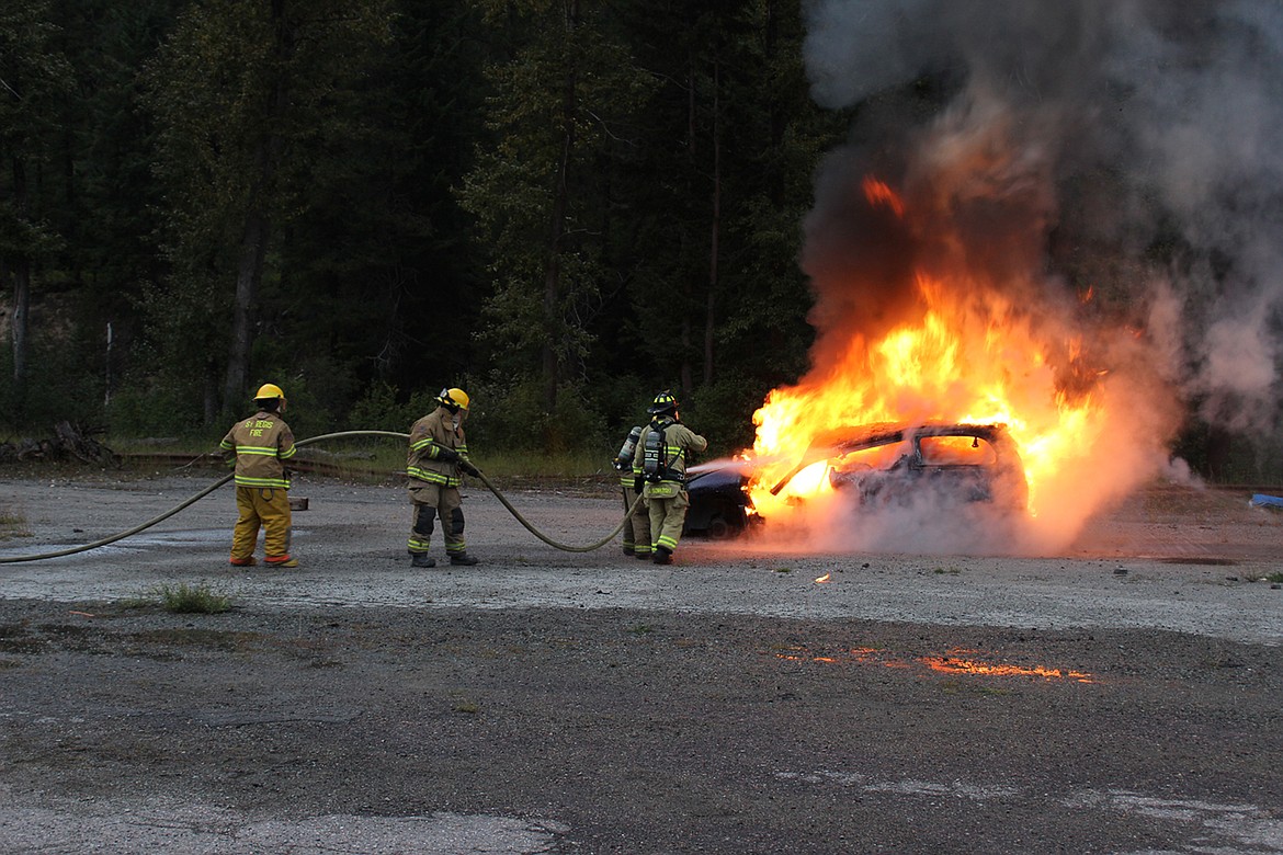 FIREFIGHTERS FROM the St. Regis, Superior and West End volunteer departments worked at the West End&#146;s Saltese fire station recently to practice with a new type of fire fighting agent. (Photo courtesy West End Volunteer Fire Department)