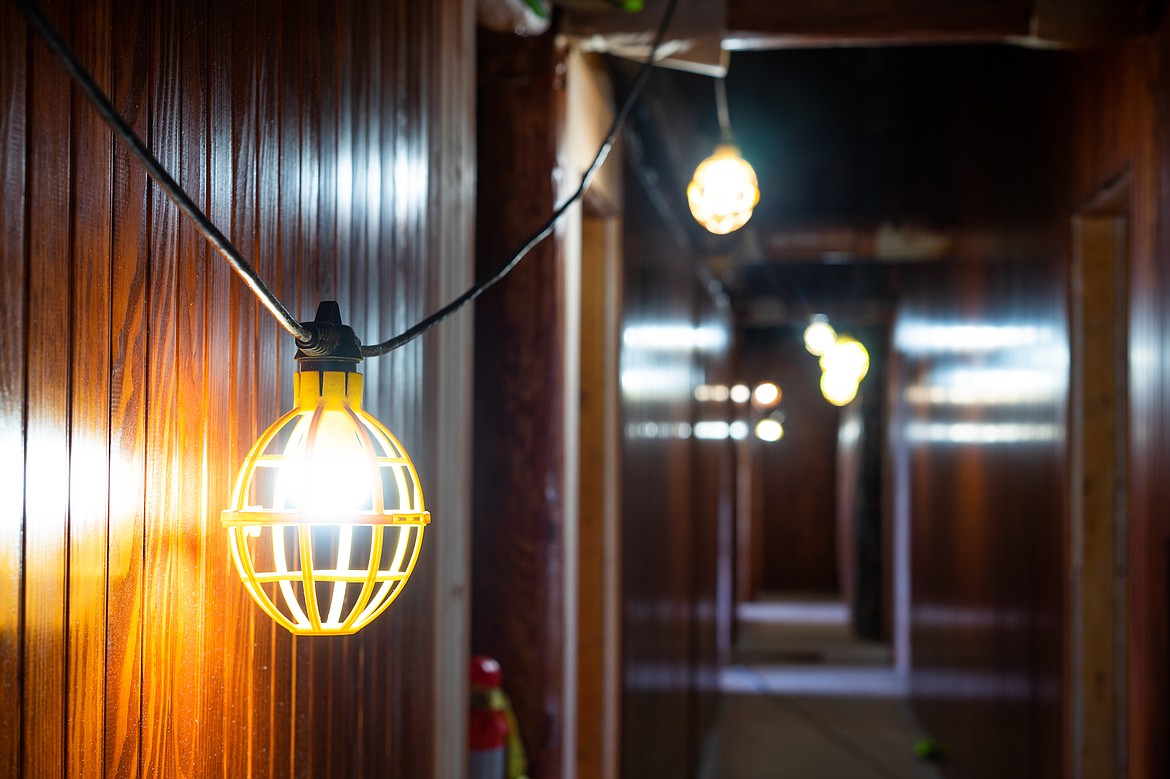 Lights hang in the empty halls of the Sperry Chalet in Glacier National Park. (Daniel McKay/Whitefish Pilot)