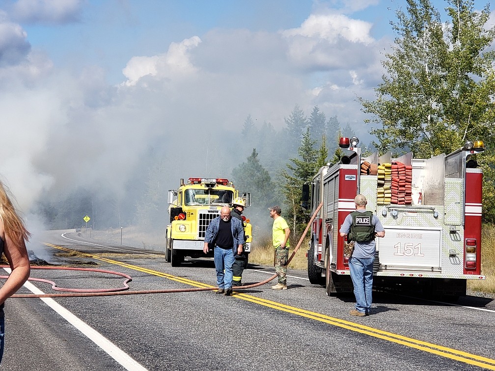 Courtesy photo
Smoke billows from the hay and trailer fire near Rock Creek on U.S. 95.