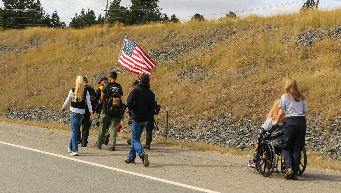 Photo by HECTOR MENDEZ JR.
The marchers on a brief stretch of HWY 95.