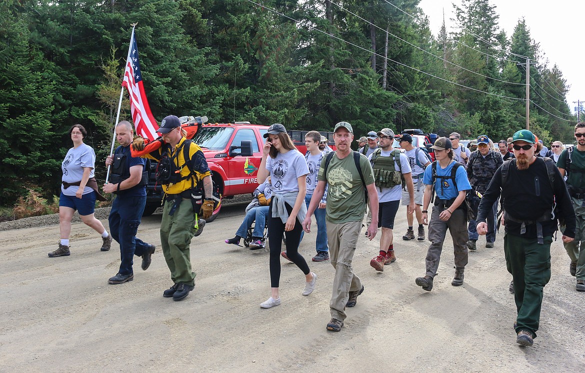 Photo by HECTOR MENDEZ JR.
The large turnout of supporters for the ruck march, setting off on their hike.