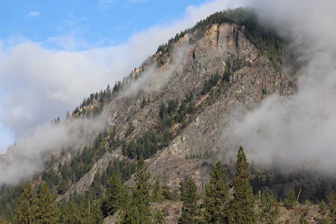 THE THOMPSON River mountains covered in clouds. (John Dowd/Clark Fork Valley Press)