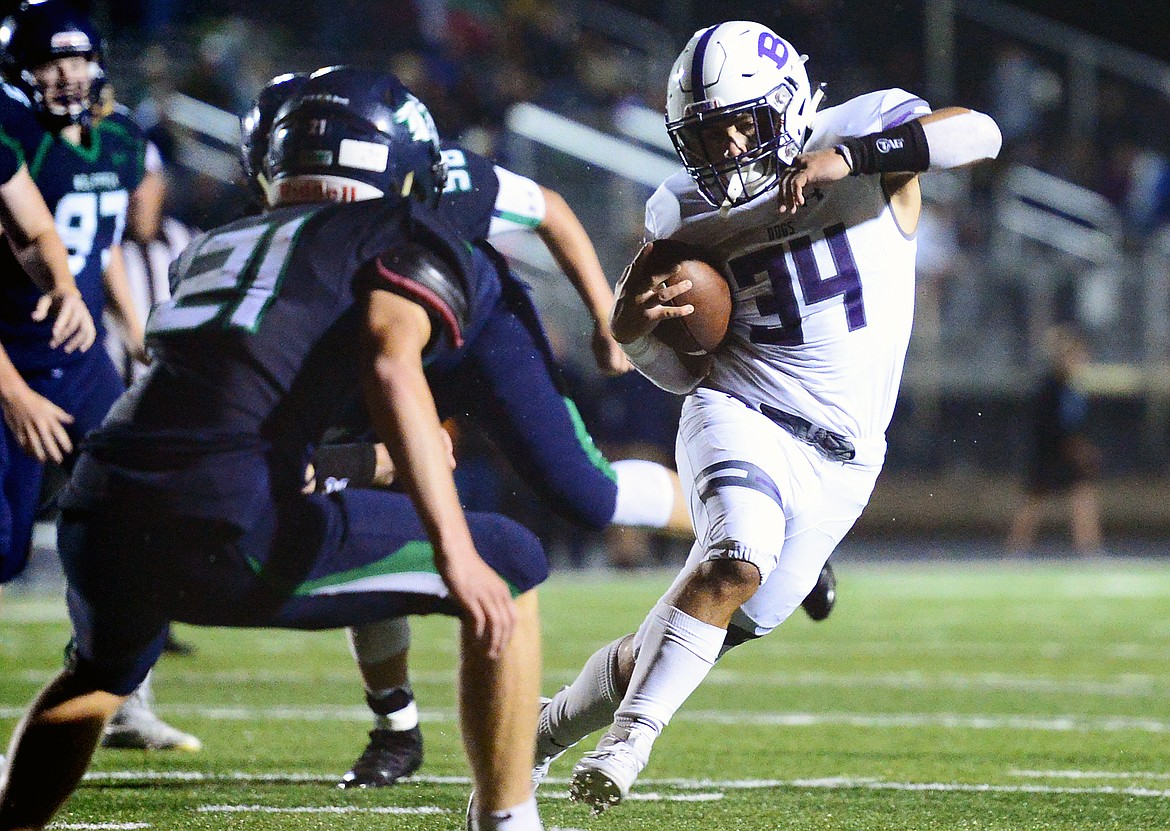 Butte running back Kameron Moreno (34) breaks a run to the outside against Glacier at Legends Stadium on Friday. (Casey Kreider/Daily Inter Lake)