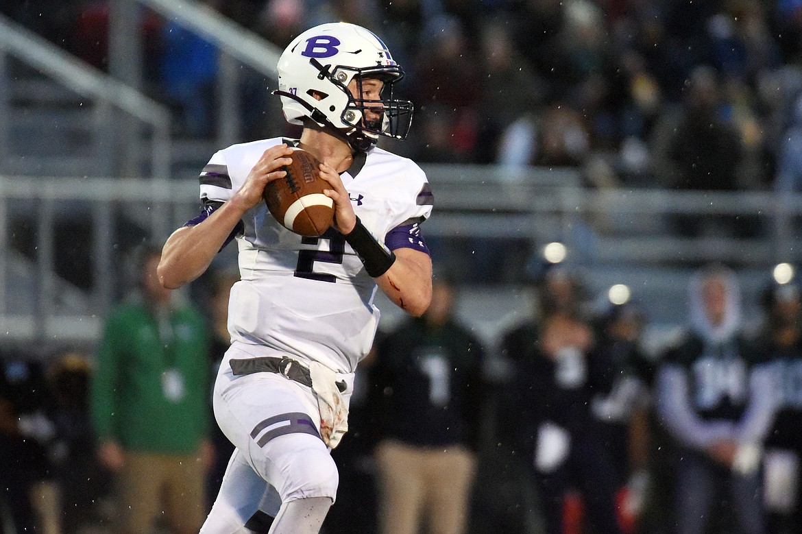 Butte quarterback Tommy Mellott (2) rolls out against Glacier at Legends Stadium on Friday. (Casey Kreider/Daily Inter Lake)