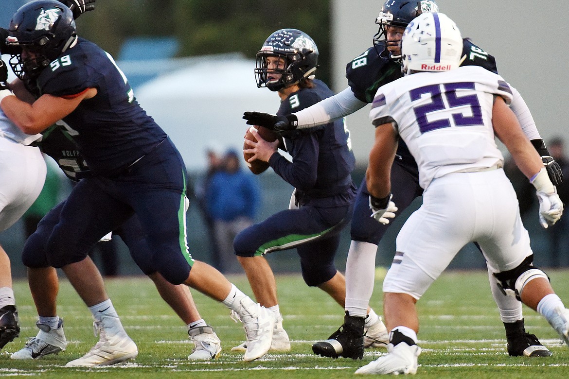 Glacier quarterback JT Allen looks to throw against the Butte defense at Legends Stadium on Friday. (Casey Kreider/Daily Inter Lake)