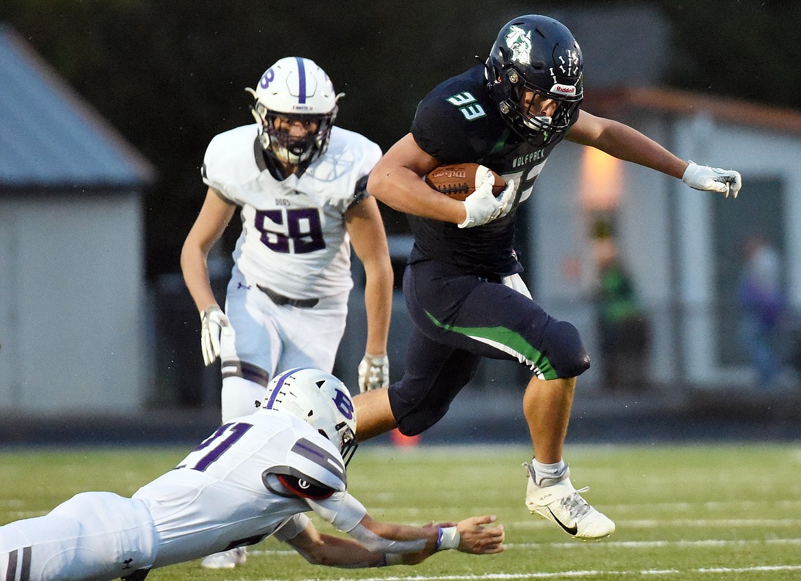Glacier running back Jake Rendina (33) breaks into the Butte secondary on a first half run at Legends Stadium on Friday. (Casey Kreider/Daily Inter Lake)