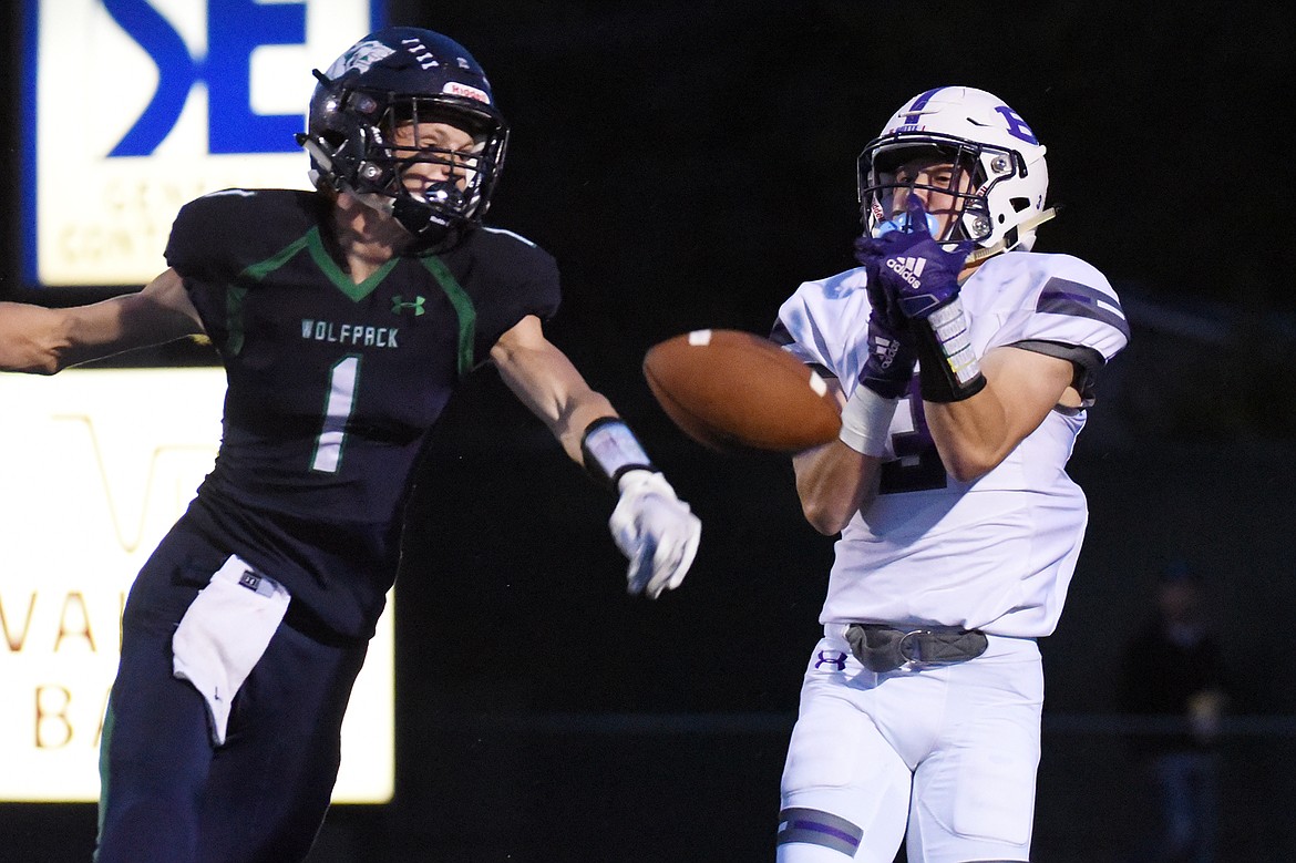 Glacier defensive back Colin Bowden (1) breaks up a pass in the end zone intended for Butte wide receiver Tucker Winston (3) at Legends Stadium on Friday. (Casey Kreider/Daily Inter Lake)