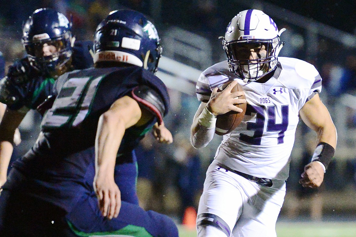 Butte running back Kameron Moreno (34) breaks a run to the outside against Glacier at Legends Stadium on Friday. (Casey Kreider/Daily Inter Lake)