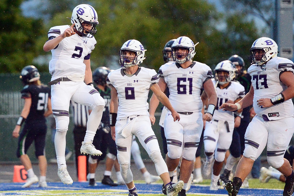 Butte quarterback Tommy Mellott (2) celebrates with teammates after a first-quarter touchdown run against Glacier at Legends Stadium on Friday. (Casey Kreider/Daily Inter Lake)