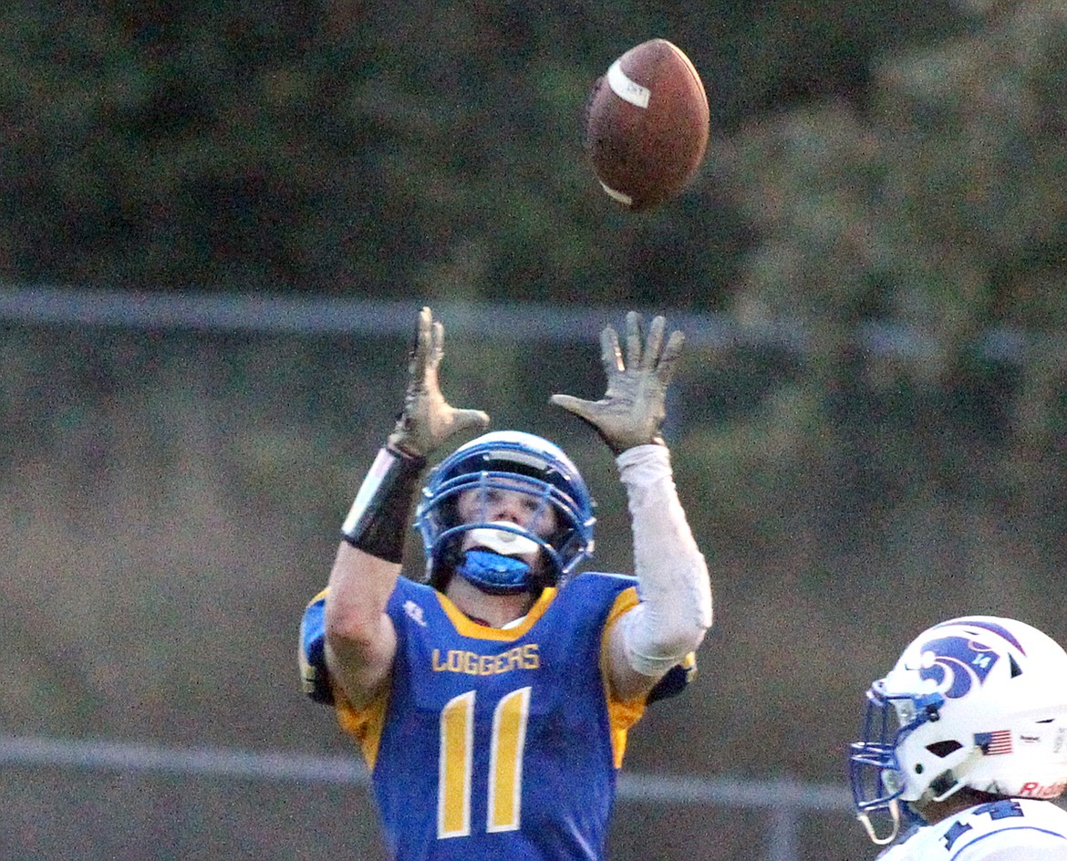 LIBBY SENIOR wide receiver Chandler Bower catches a pass for a touchdown in second quarter vs. Columbia Falls Friday, Sept. 20. (Paul Sievers/The Western News)