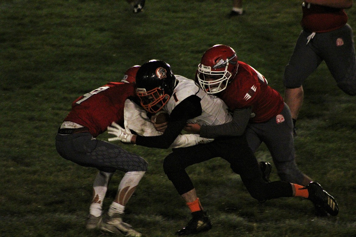 TREYDON BROUILLETTE pushing through the line to gain a few yards. (John Dowd/ Clark Fork Valley Press)