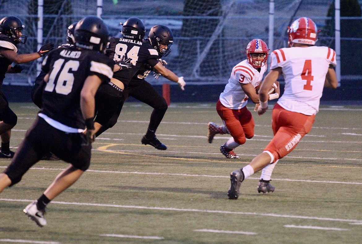 Casey McCarthy/ Columbia Basin Herald Nathan Garza makes the return for the Huskies on Friday night in Royal City.