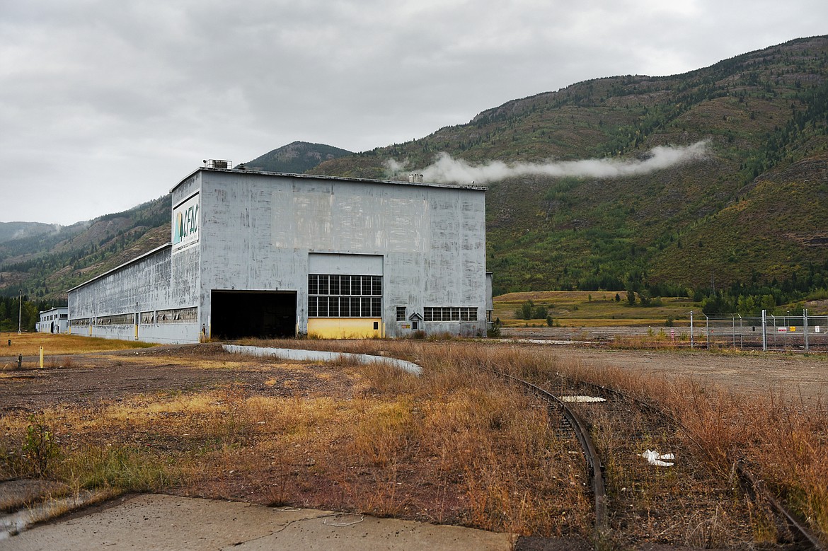 An old rail line leads away from a remaining warehouse building on the Columbia Falls Aluminum Co. property on Wednesday, Sept. 18. (Casey Kreider/Daily Inter Lake)