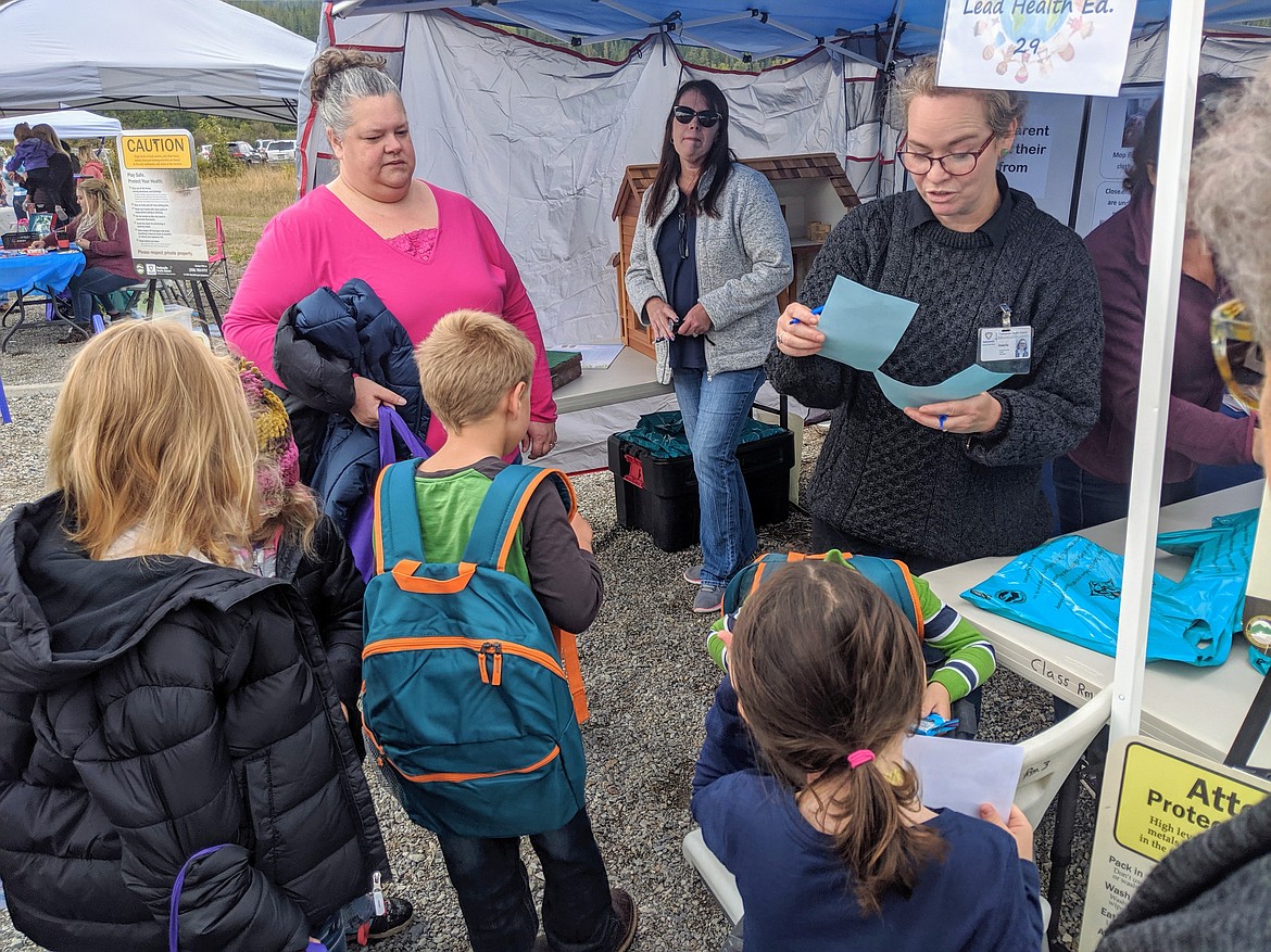 Panhandle Health District environmental health specialist Val Wade talks to kids about the dangers of lead poisoning.