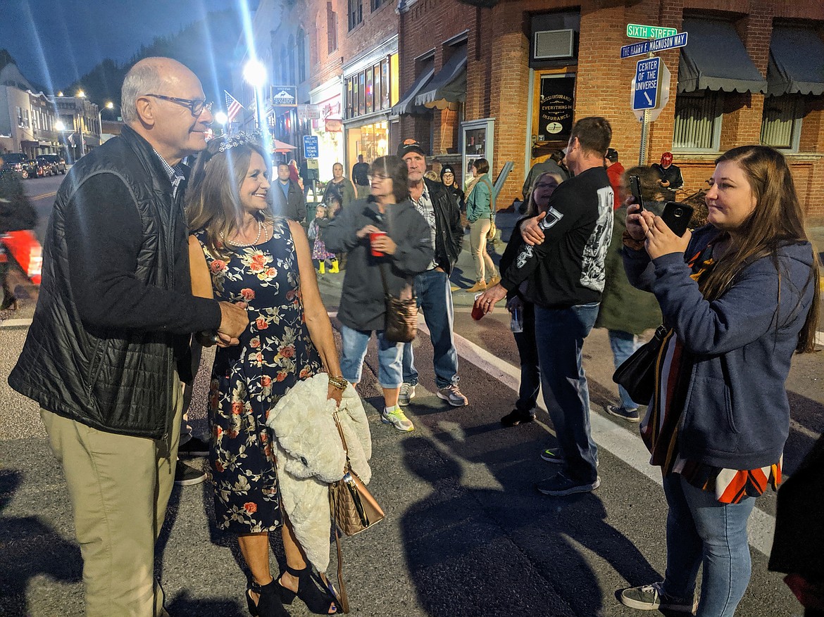 Harry Smith takes a photo with a local fan.