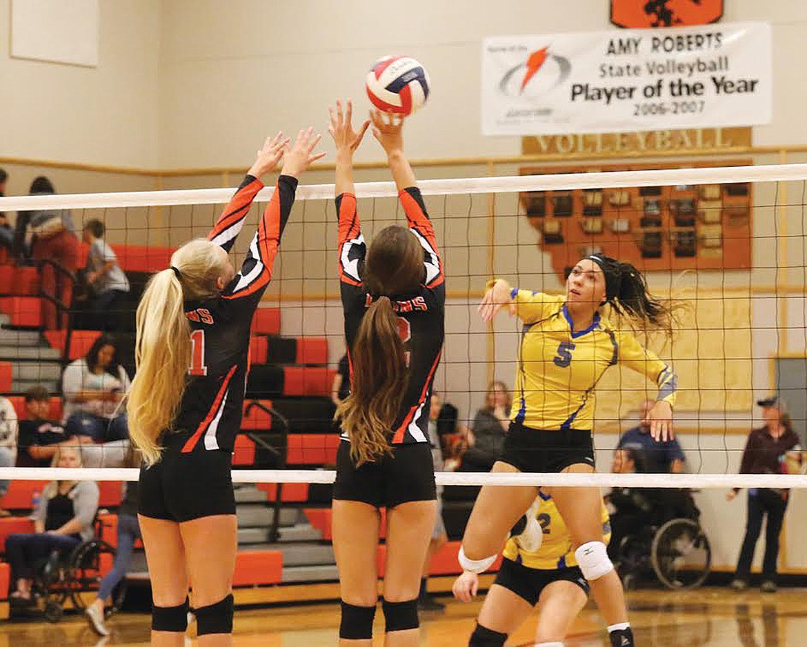 LIBBY JUNIOR hitter Olivia Gilliam Smith gets one past Lion defenders at the Sept. 17 Battle of the Kootenai. (Nikki Meyer/Tobacco Valley News)