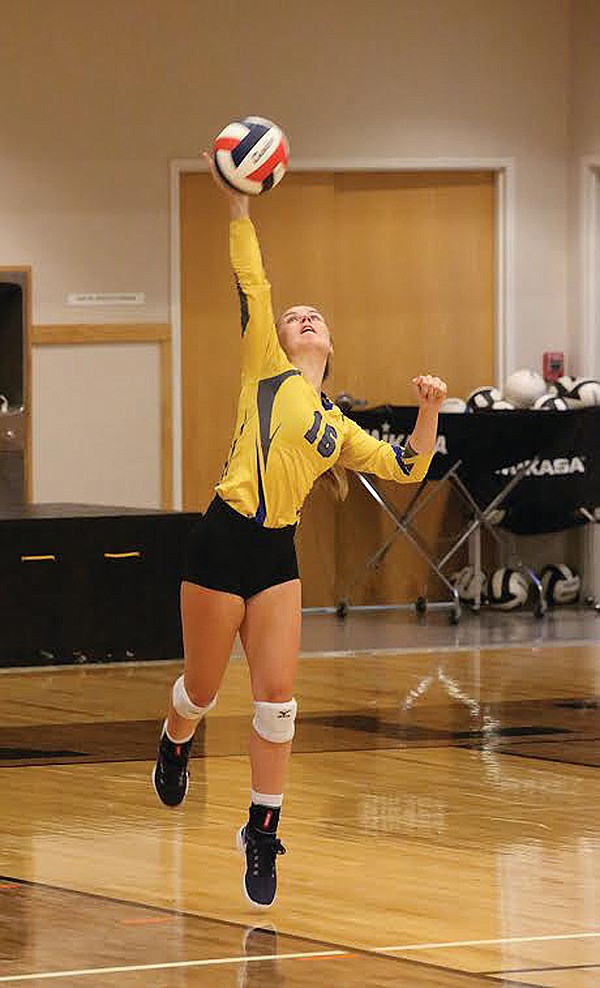 LIBBY SENIOR Kylee Quinn serves to the Eureka Lions at the Sept. 17 Battle of the Kootenai volleyball matchup. (Nikki Meyer/Tobacco Valley News)