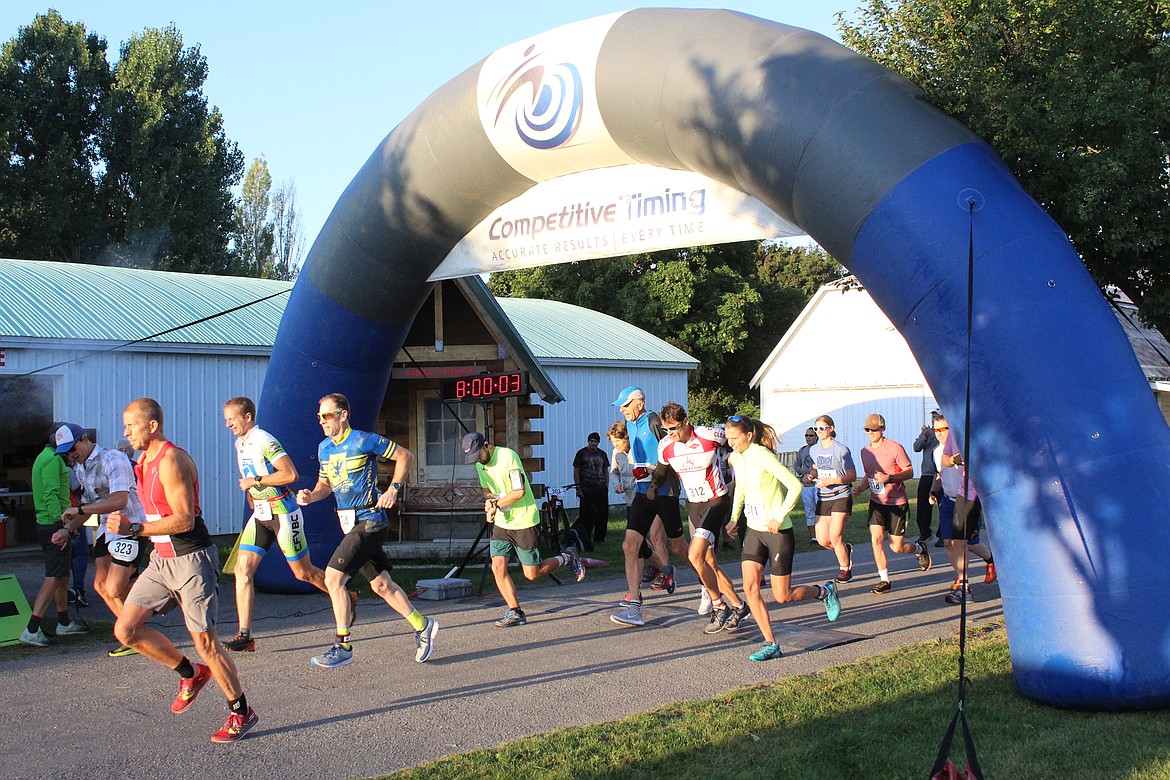 THE RUNNERS take off from the starting line of the Clark Fork Adventure Challenge. (John Dowd/ Clark Fork Valley Press)