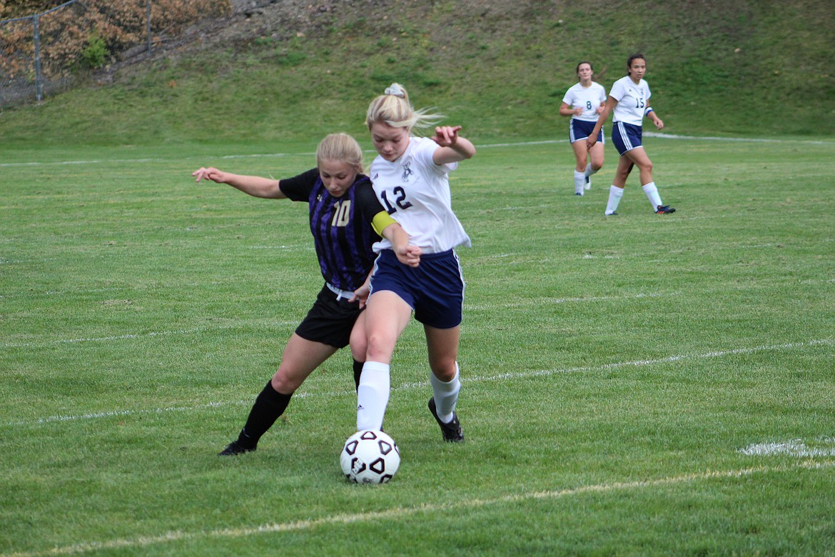 Courtesy image/ Wildcat Lora Allred battles for position during the Wildcats tie with Bonners Ferry last week.